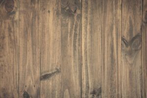 High-resolution image of rustic wooden planks with detailed grain texture, perfect for backgrounds.